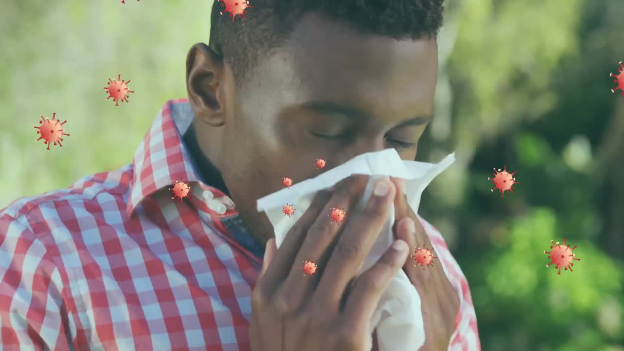 animación de la célula del virus sobre un hombre afroamericano enfermo que tiene la nariz que corre