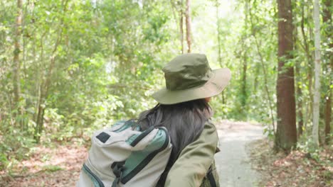 woman hiking in a forest