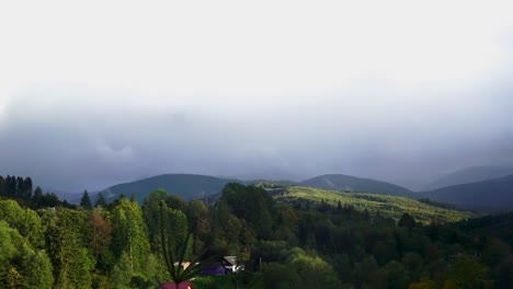 Panoramic-,-close-up-shot-of-mountains-with-rainbow