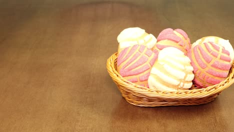 basket with sweet bread passes by a side dolly shot