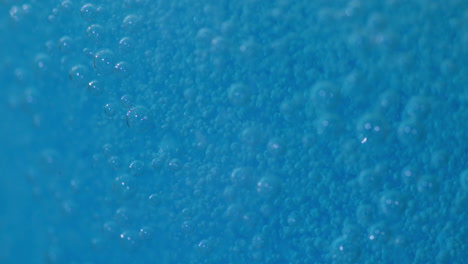 close up footage of blue fizzy bubbles