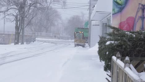 plowing sidewalks in a snowstorm