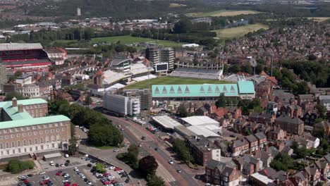 Aerial-approch-tilting-down-towards-Trent-Bridge-Cricket-Ground-in-Nottingham,-England