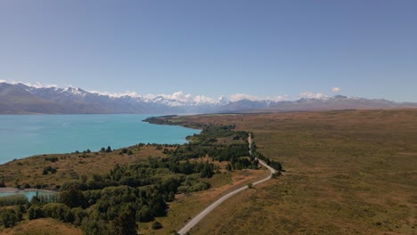 the vast, wild east shore of lake pukaki, new zealand on a sunny day