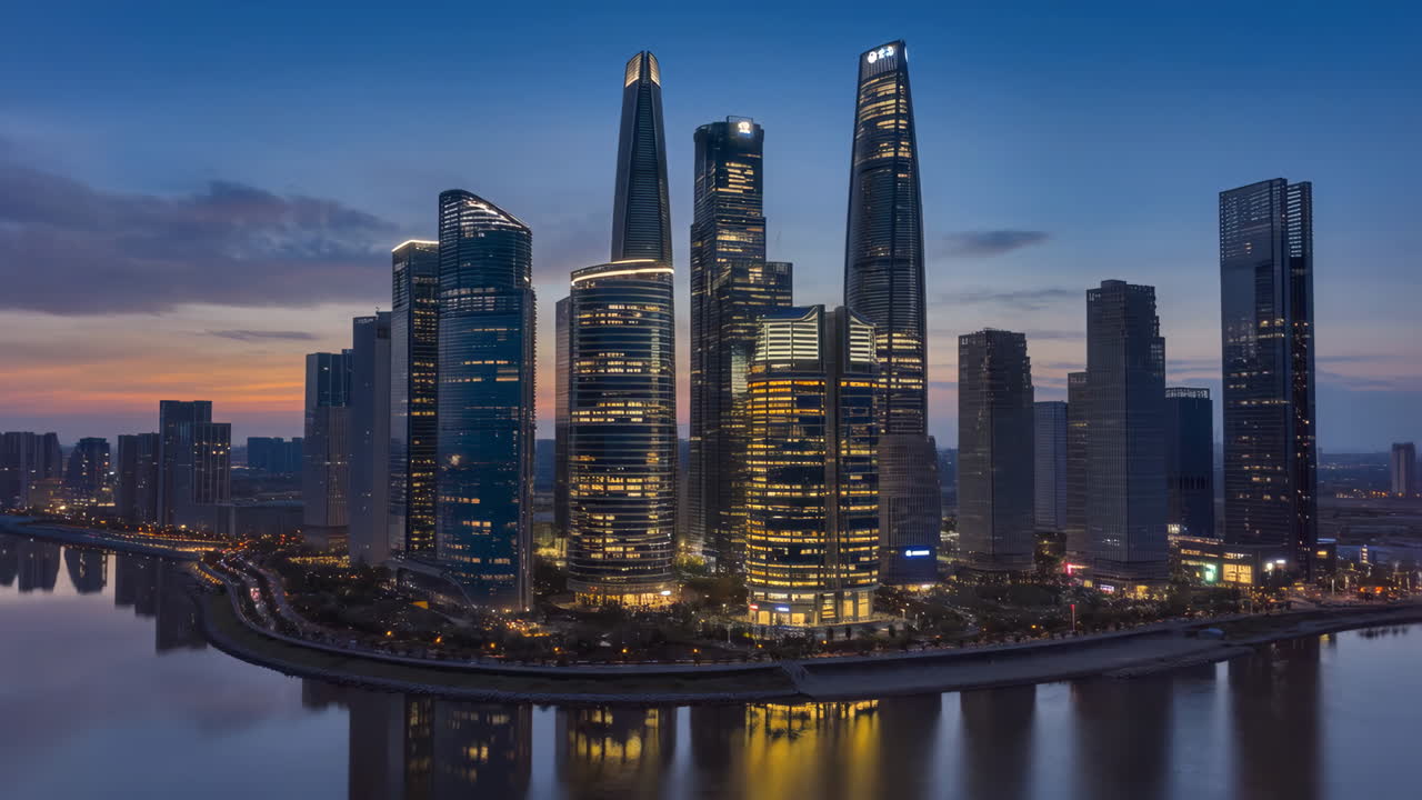 Modern City Skyline at Dusk Reflected on Water