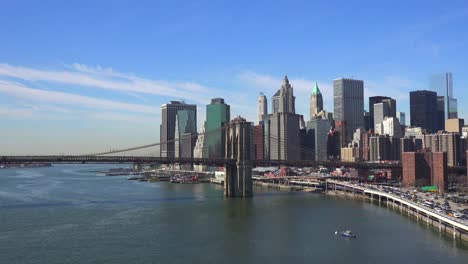 the brooklyn bridge east river and fdr parkway on a clear sunny day in new york city 7