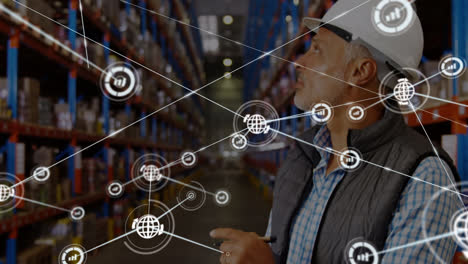 animation of network of connections with icons over biracial male worker in warehouse