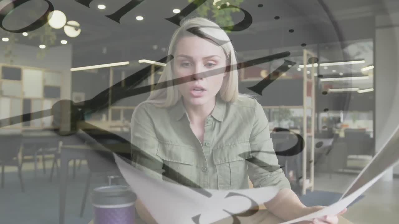 Animation of clock over caucasian businesswoman holding document
