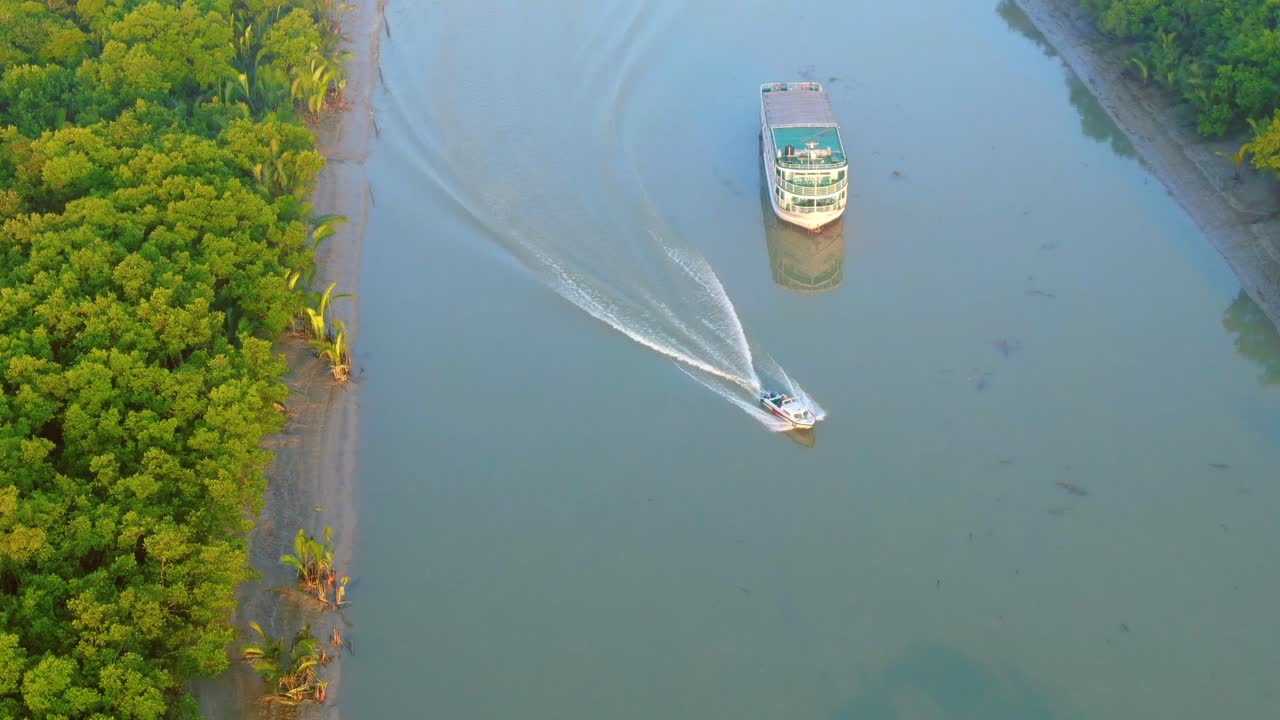 4K Drone footage. Drone view of tourist boat from downwards in sundarbans. Sundarbans in Bangladesh with scenic beauty. scenic beautiful natural atmosphere