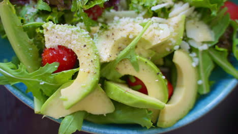 avocado salad with mixed greens and parmesan