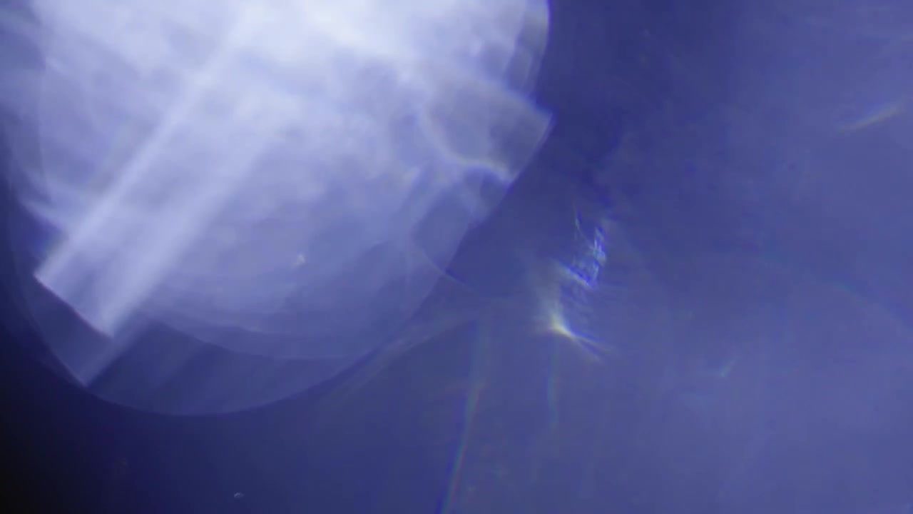 Abstract Light Leaks and Lens Flare with Blue and Purple Hues