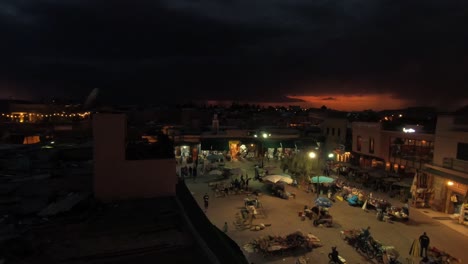 stormy night with lightnings in marrakesh. evening with a strong orange sunset and storm.