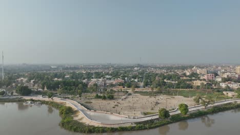 Indus-River-curving-through-Sukkur,-Sindh---aerial