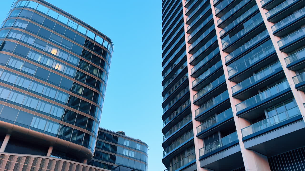 New beautiful modern high-rises of glass and metal. Low angle view at the multi-storied buildings in Bratislava, Slovakia