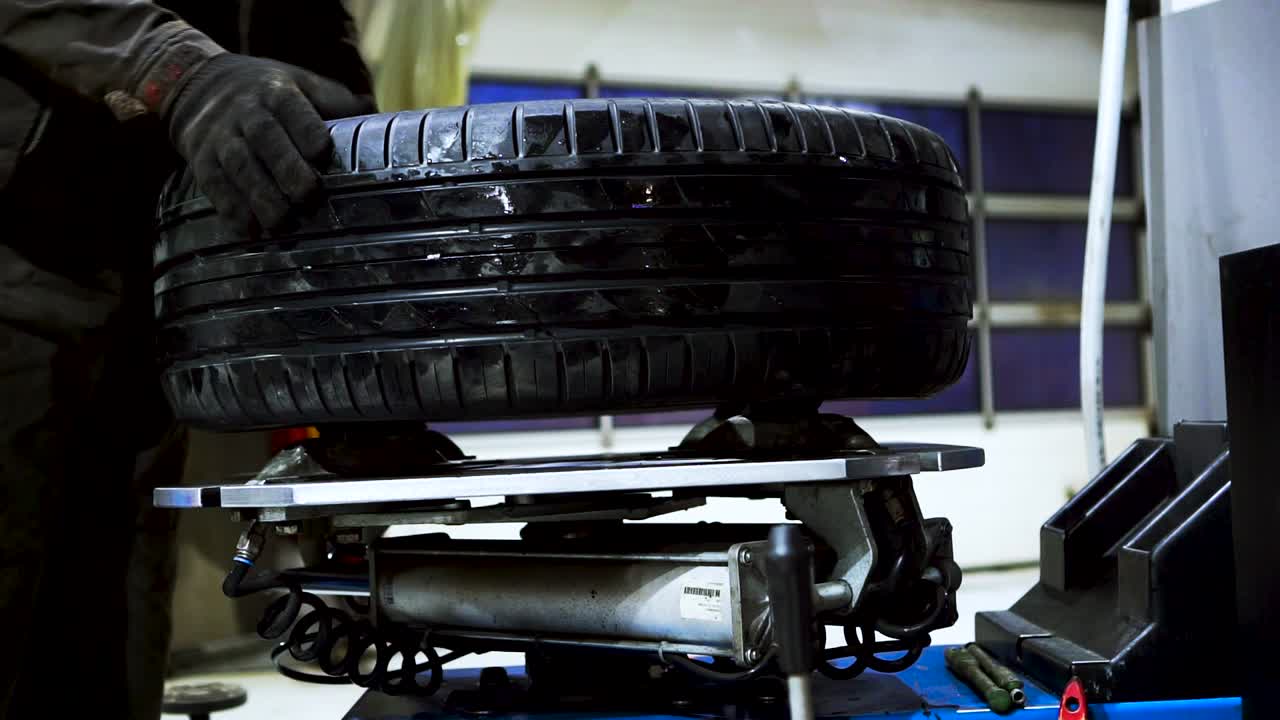 Car Tire Balancing at a Repair Shop