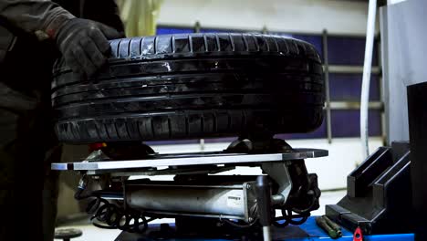 car tire balancing at a repair shop