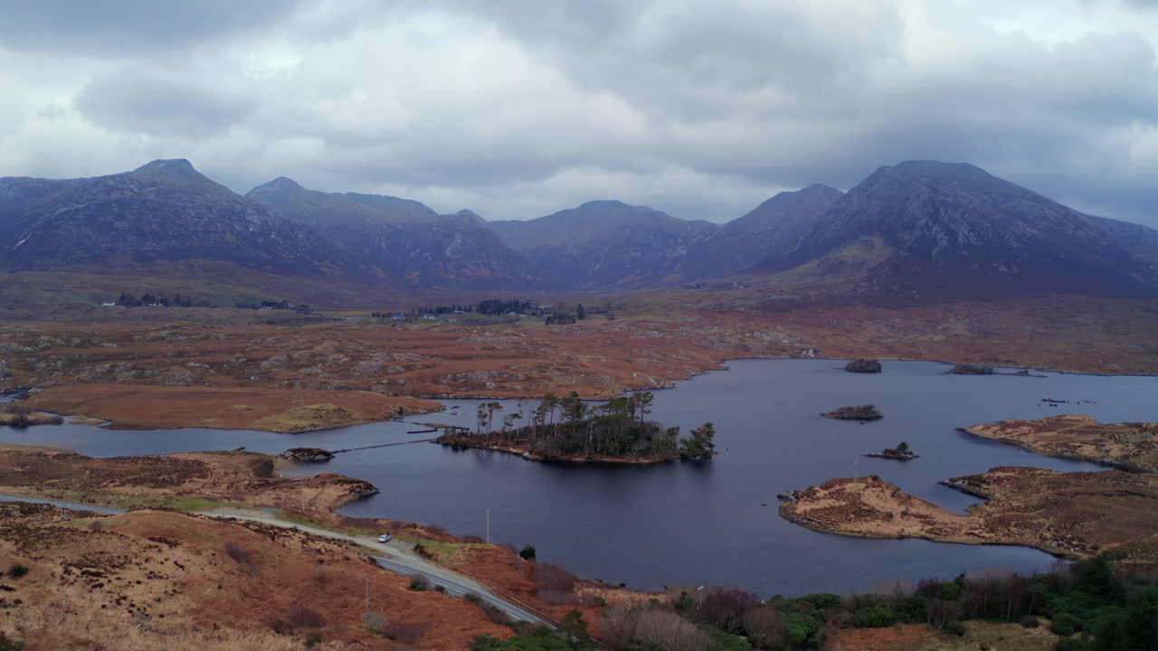 Aerial reverse dolly of Pine Island, unveiling Connemara’s dramatic landscape