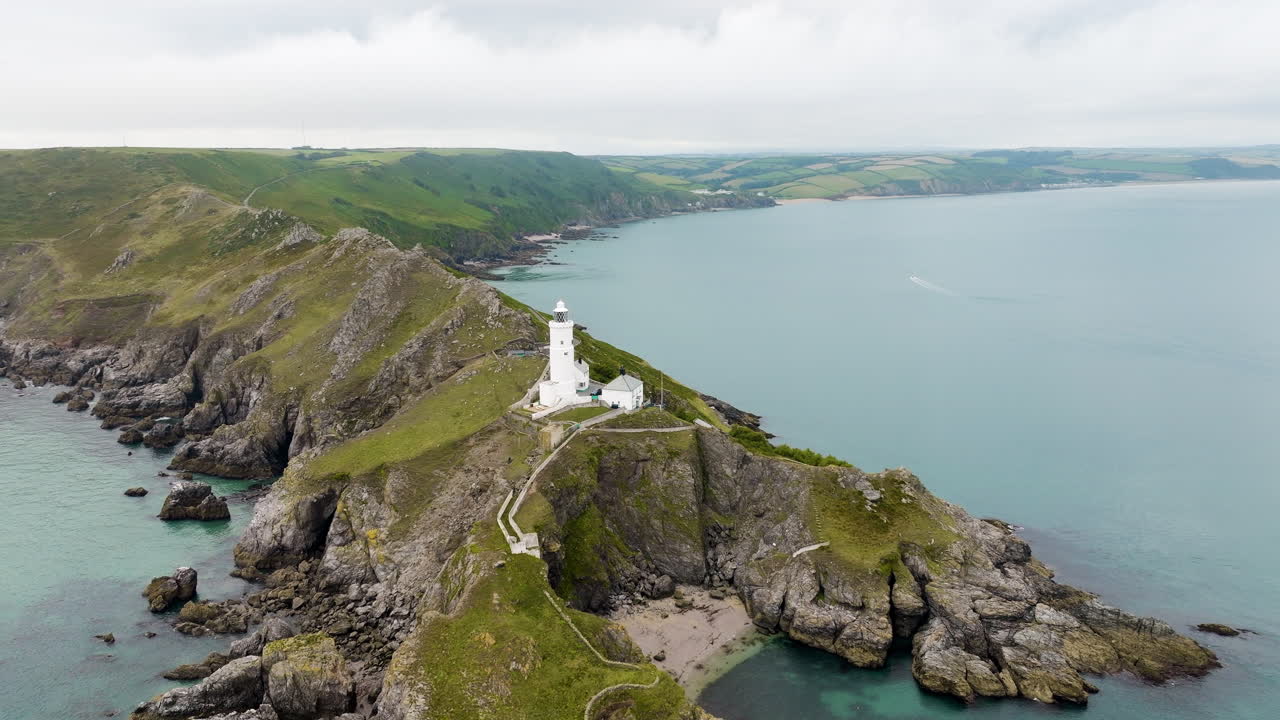 Aerial View of a Lighthouse on a Coastal Cliff