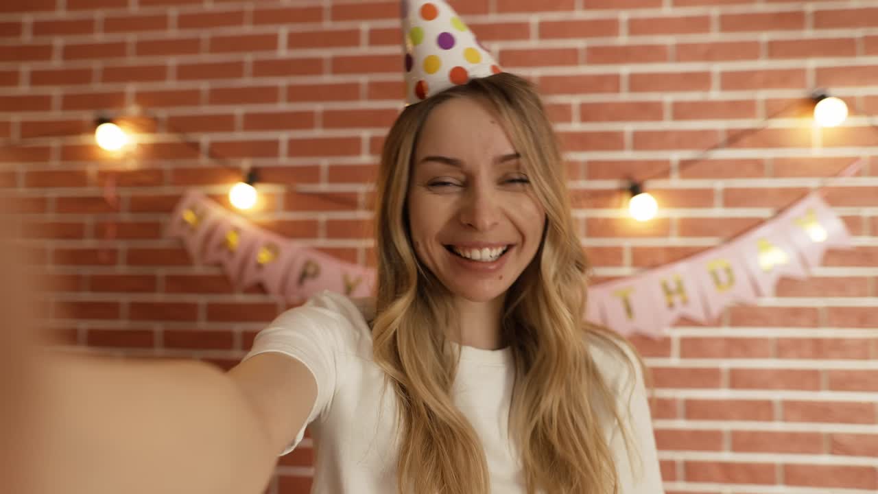Excited girl shout Happy Birthday on front camera