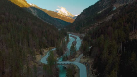 alps mountain river aerial cinemagraph seamless video loop of a scenic and idyllic canyoning waterfall with fresh natural blue water in the bavarian austrian alps, flowing along canyon forest trees. 4k uhd. rissach tyrol austria engtal ahornboden