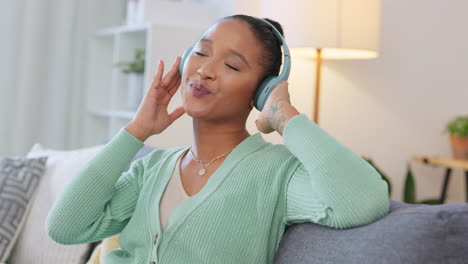 woman listening to music on headphones