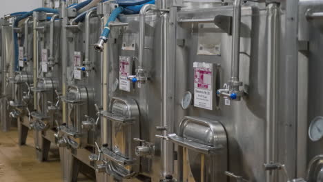 stainless steel industrial tanks in a food processing facility