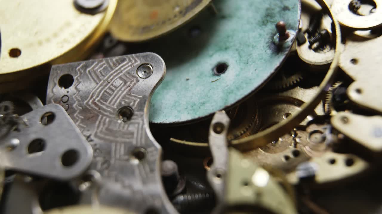 Close-up of various parts of a clock
