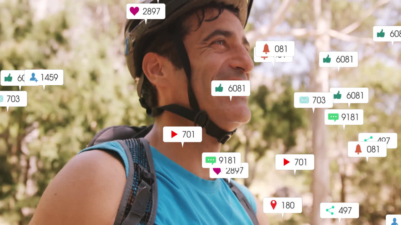 Smiling man wearing helmet with animation of social media notifications around him