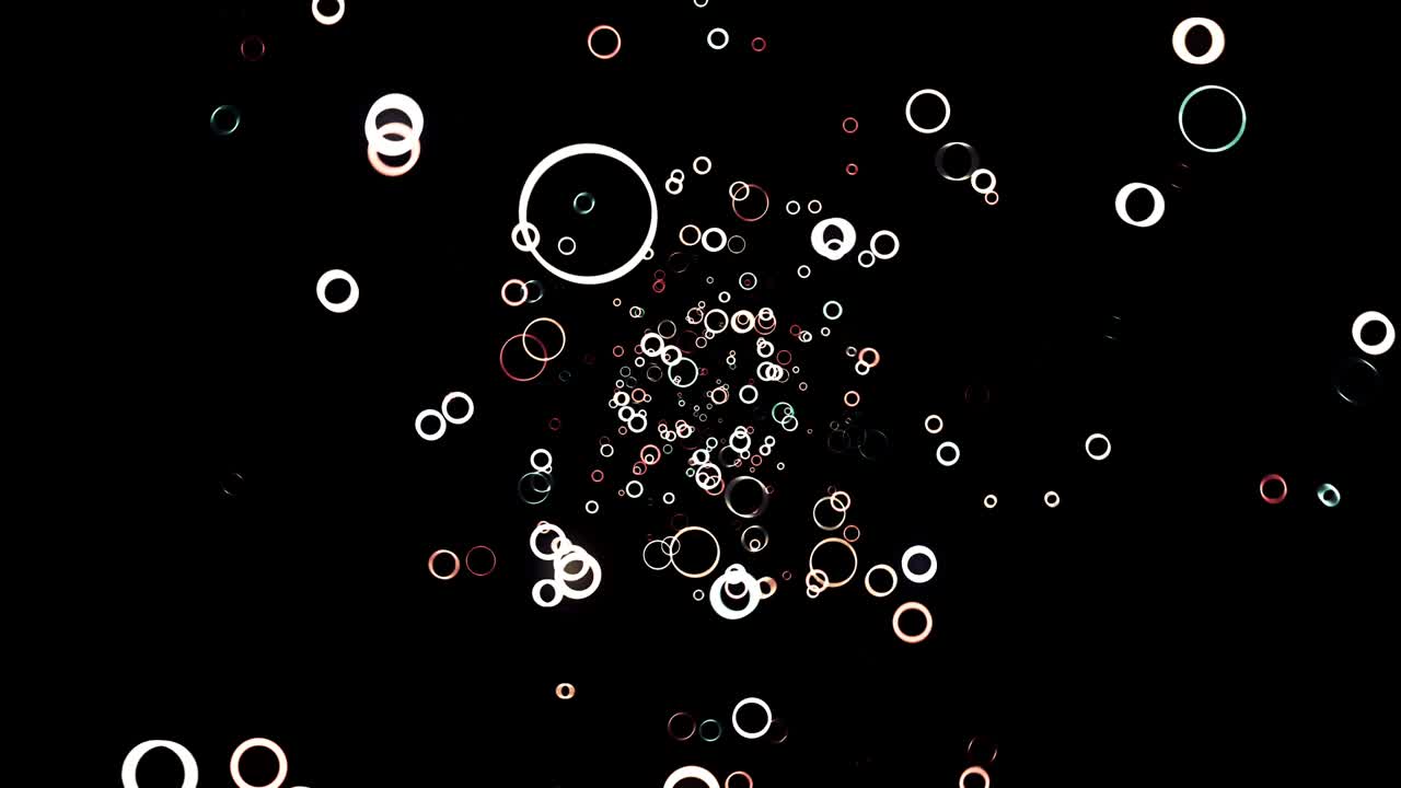 Abstract animation of white and red small green rings floating on the black background. Animation. Circle frames flying away in the darkness and disappear