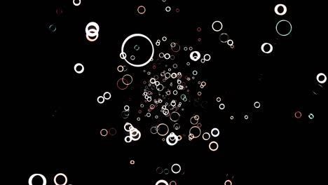 abstract animation of white and red small green rings floating on the black background. animation. circle frames flying away in the darkness and disappear