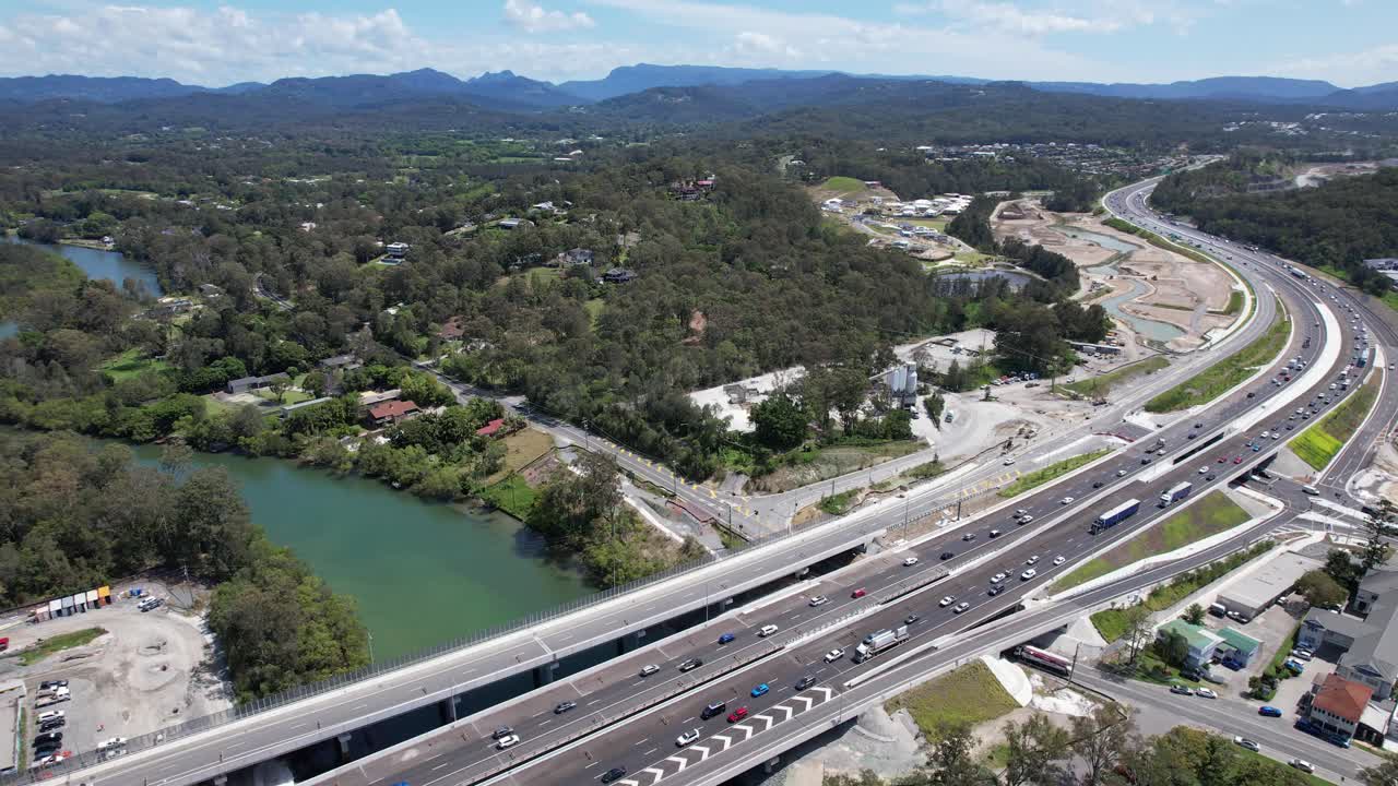 Aerial View of Highway Bridge Construction over River