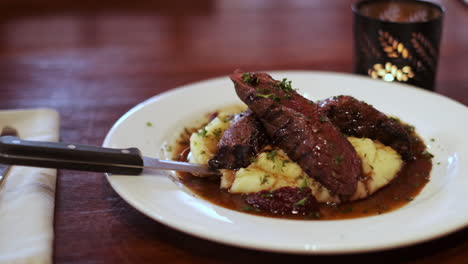 typical australian kangaroo meat served with mashed potatoes