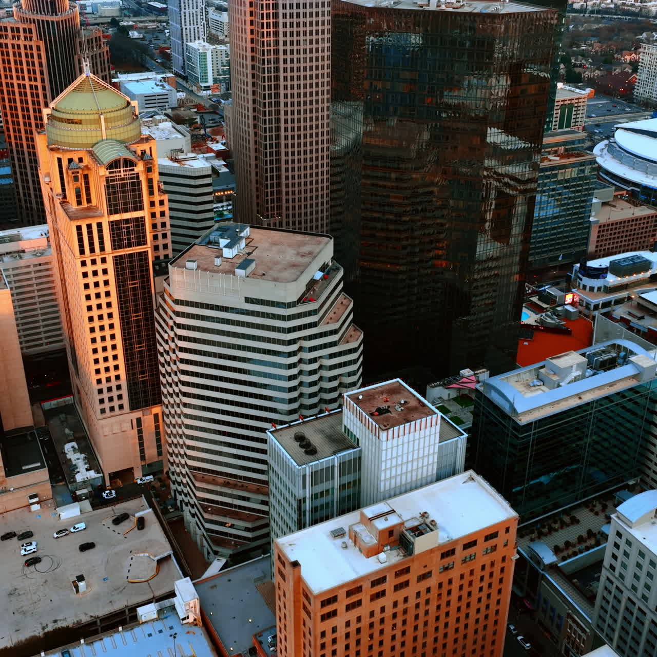 City downtown densely built with modern buildings of diverse height and design. Uptown of Charlotte, North Carolina, USA from air.
