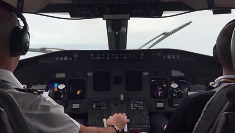 jet cockpit view during a real flight through bad weather with a stormy sky