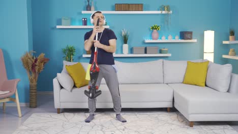 the man who started singing by imagining the broom in his hand as a microphone while cleaning.