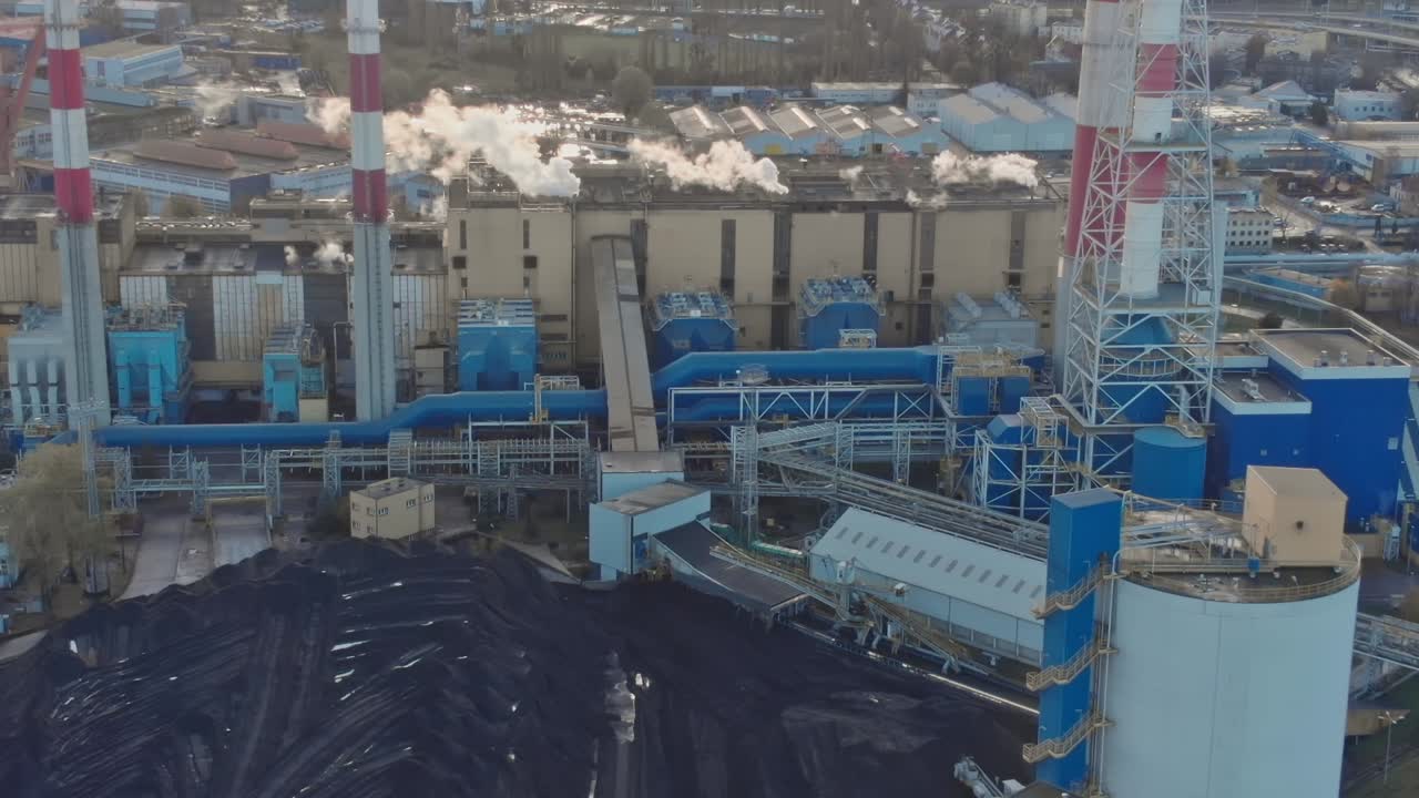 Coal storage site in Gdansk, Poland shows large pile of black coal