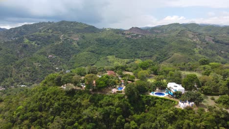 luxury estate with pool and tennis court in tropical mountains
