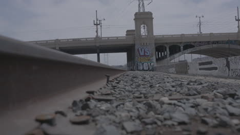 close up shallow focus shot of abandoned train tracks in downtown los angles on a bright sunny day