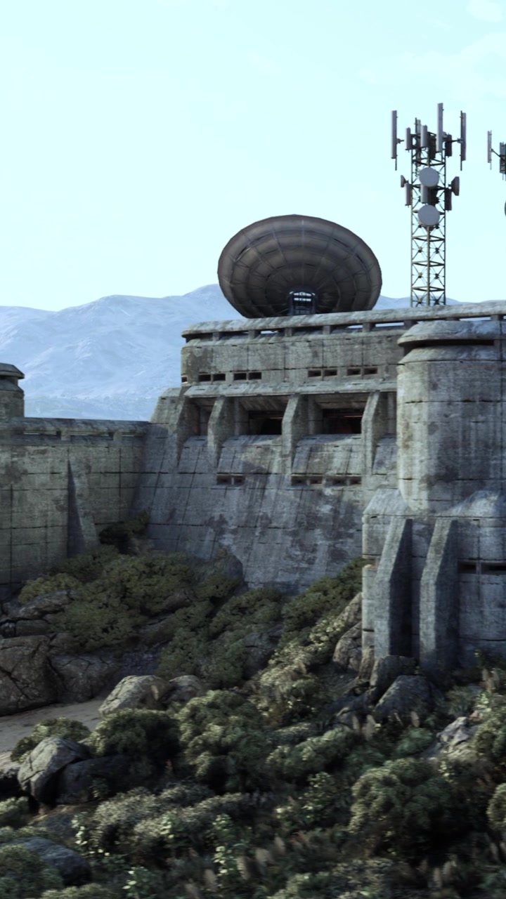 Old concrete building with communication towers in a mountainous area