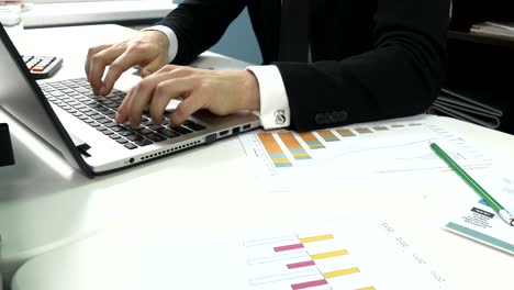 businessman working on financial reports