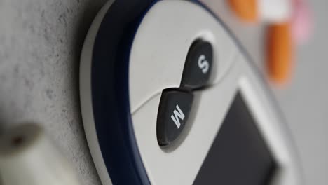 close-up of a blood glucose meter