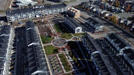 Revealing-drone-shot-of-the-newly-built-townhomes-in-Quarry-Park-community-in-Calgary