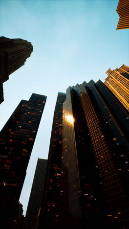 looking up at skyscrapers in a modern city