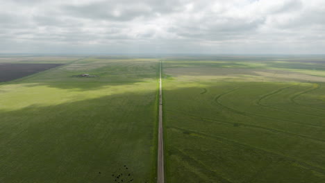 aerial view of farmland and country road