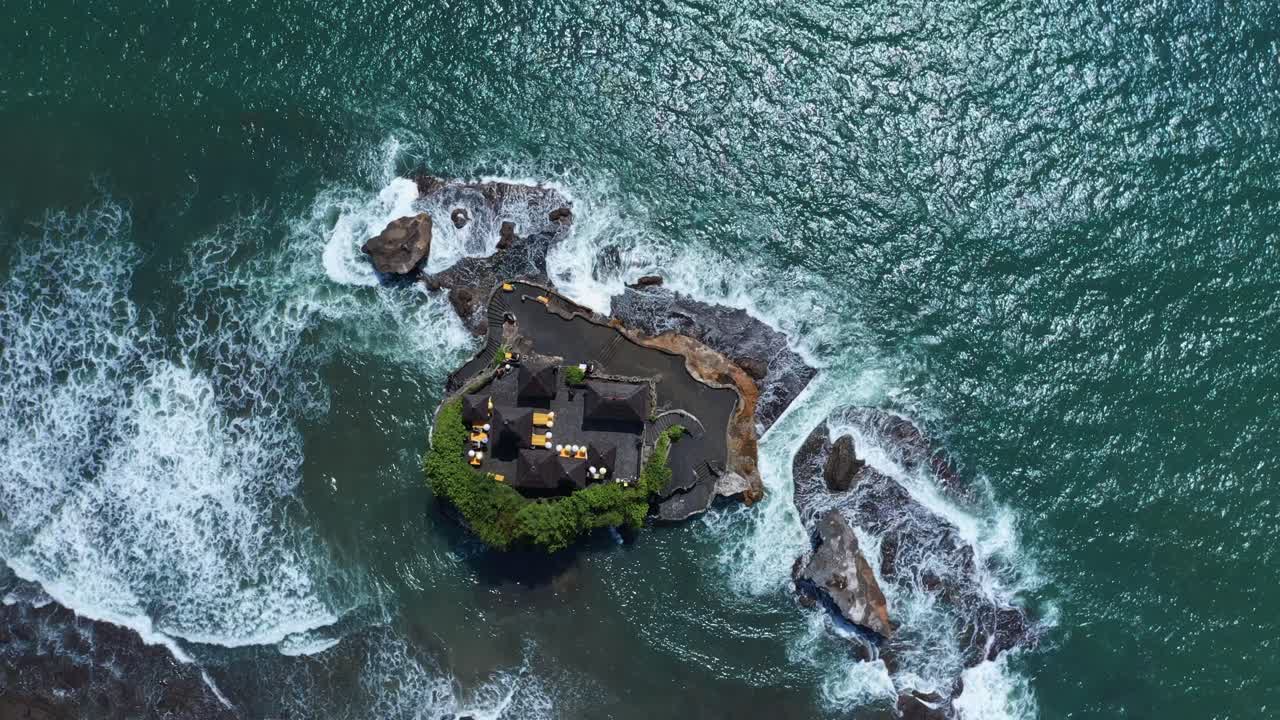 Bird's Eye View Over Tanah Lot Temple In The Sea In Bali, Indonesia - drone shot