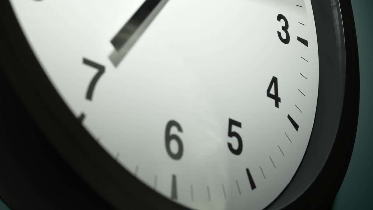 Clock Face on Dark Green Wall in Time Lapse