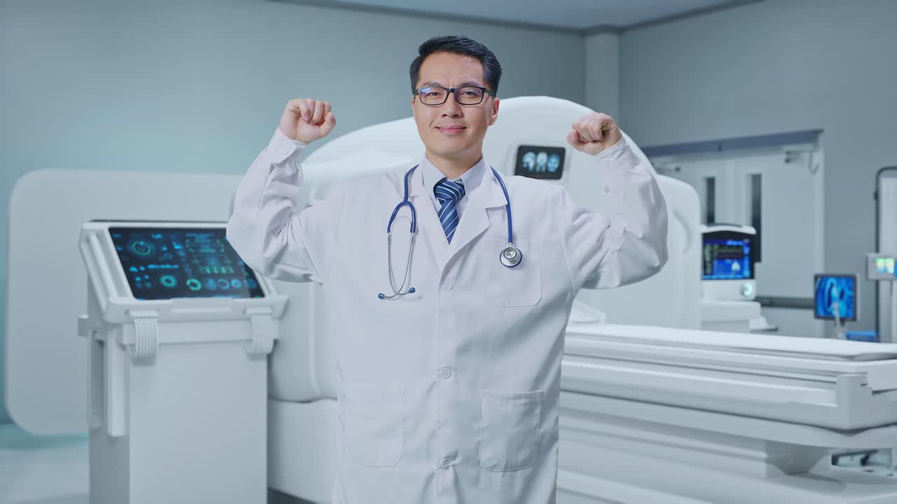 Asian Male Doctor Smile And Flex Muscle With MRI Machine In The Hospital