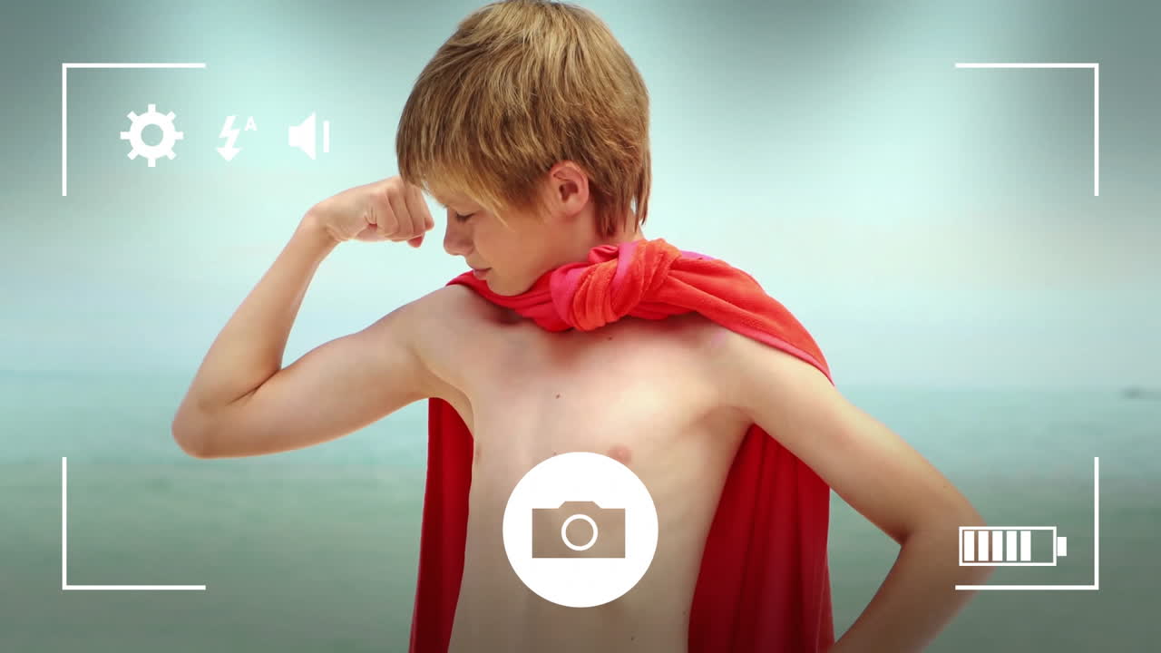 카메라 화면의 애니메이션은 카우카시안 소년이 케이프를 입고 바가에서 근육을 구부리는 모습입니다.