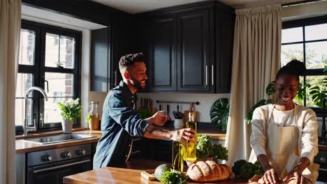 happy couple cooking together in the kitchen