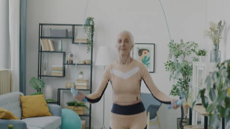 senior woman jumping rope at home